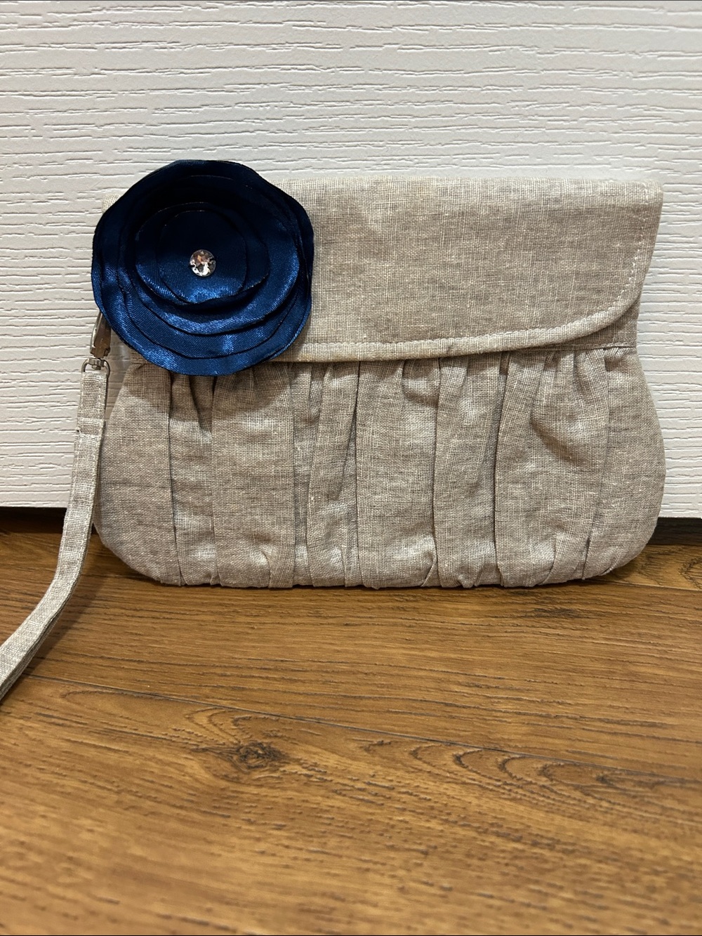 Neutral Linen Wristlet Clutch with Navy Flower Accent